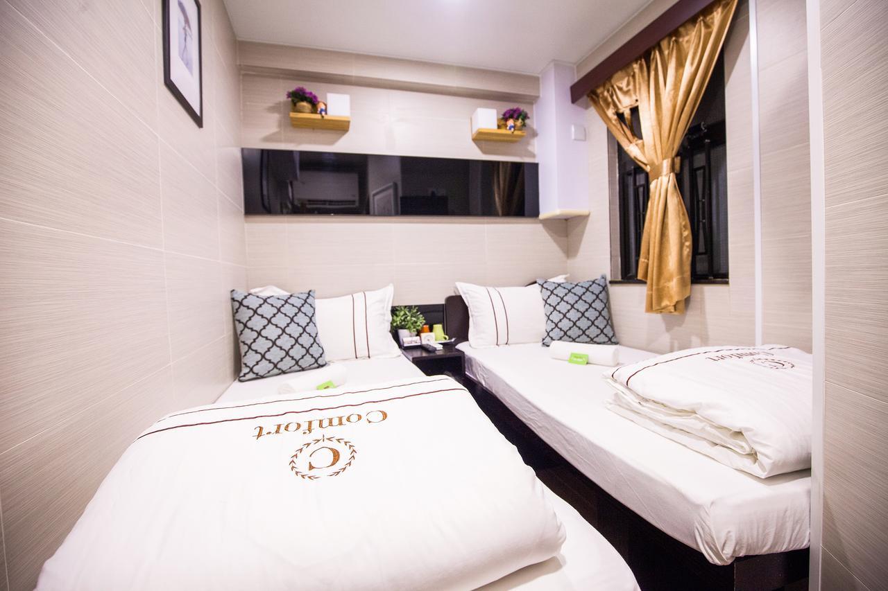 Smiley Inn Цзюлун Экстерьер фото