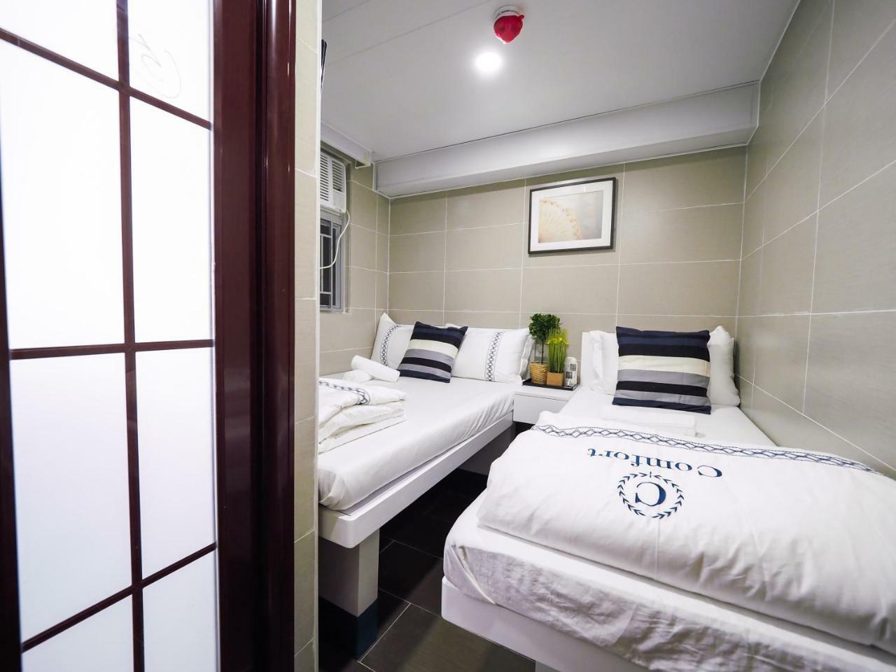 Smiley Inn Цзюлун Экстерьер фото